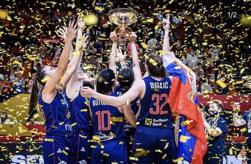 Dajana Butulija and teammates celebrating the EuroBasket championship with gold confetti